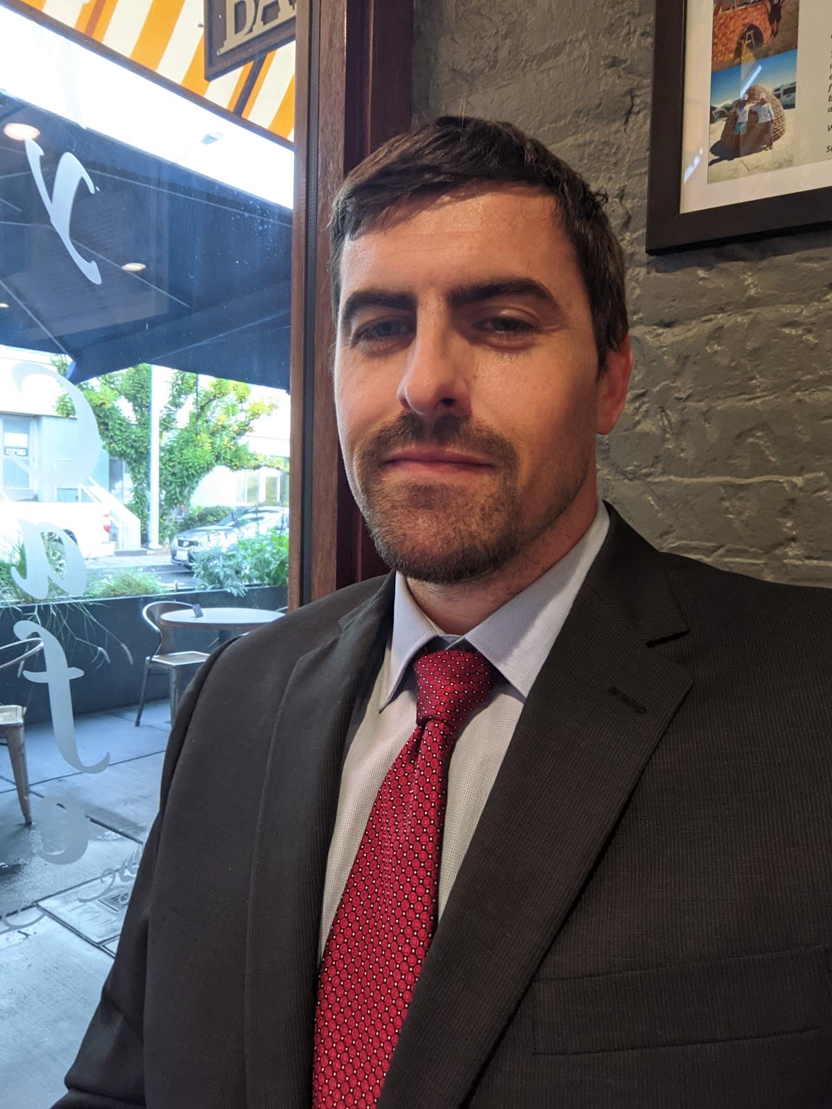 Russell Green in professional attire